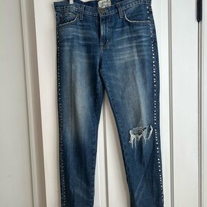 Current Elliott mid rise distressed jeans with studs along both legs.
